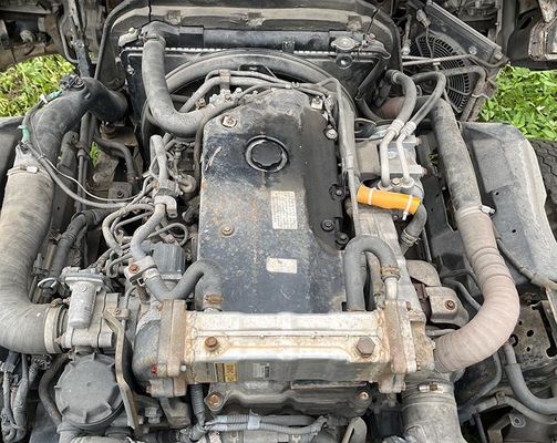 Camión usado Isuzu ELF 600p Camión de carga 4KH1 Motor diesel y carrocería blanca