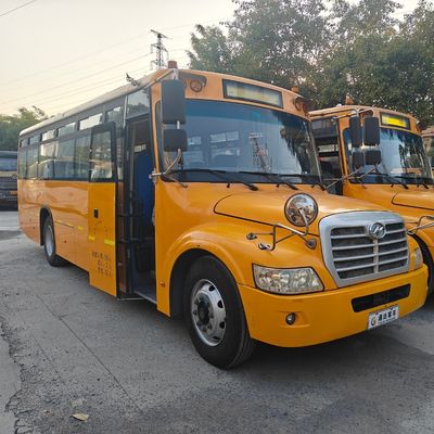 Venta de autobuses de segunda mano de 56 asientos Precio amarillo del autobús escolar para China